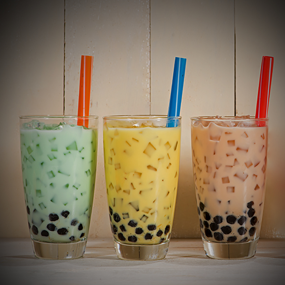 Boba / Bubble tea. Homemade Various Milk Tea with Pearls on wood